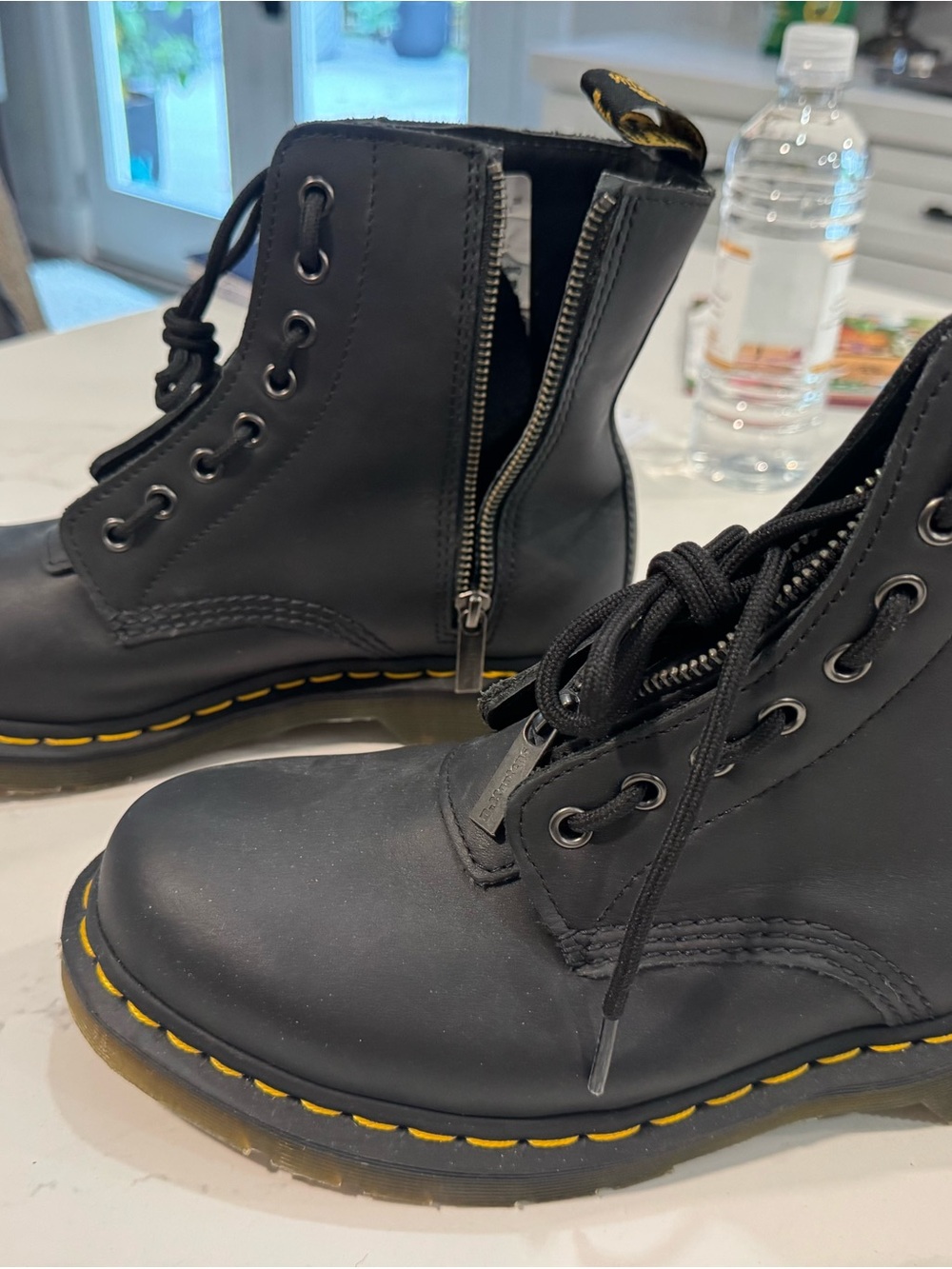 Dr. Martens Black Lace-Up Boots with Yellow Welt Stitching